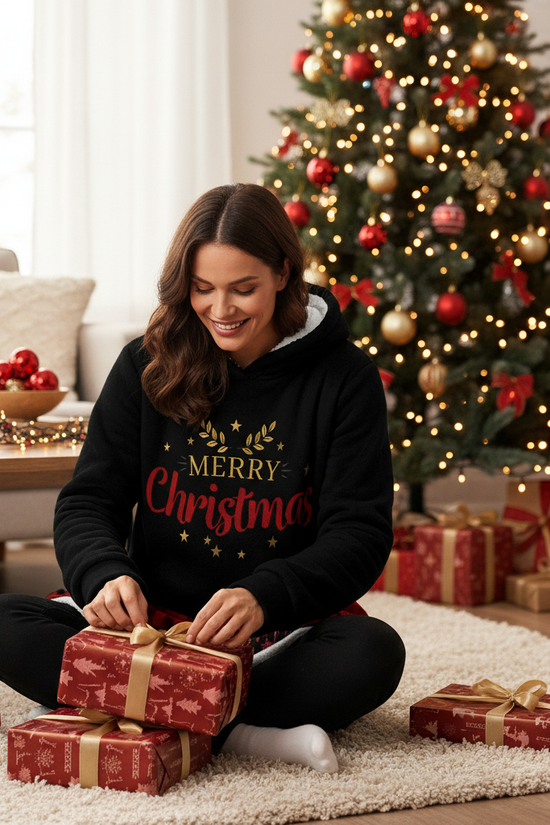 Woman sitting on rug wrapping gifts