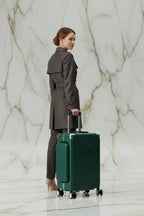 Woman with luggage back angle