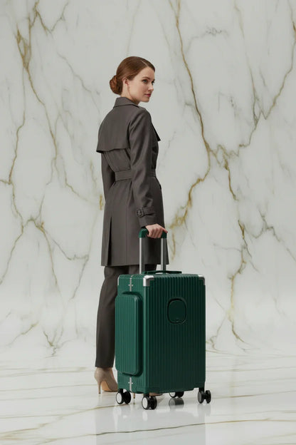 Woman with luggage back angle