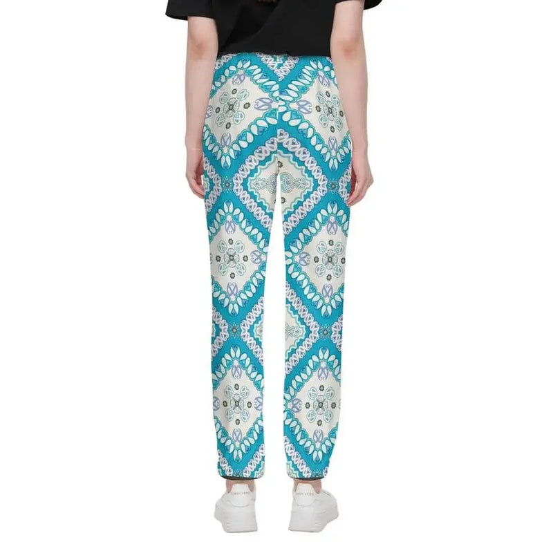 Woman wearing turquoise and white decorative casual fit jogging pants from IVORYNN