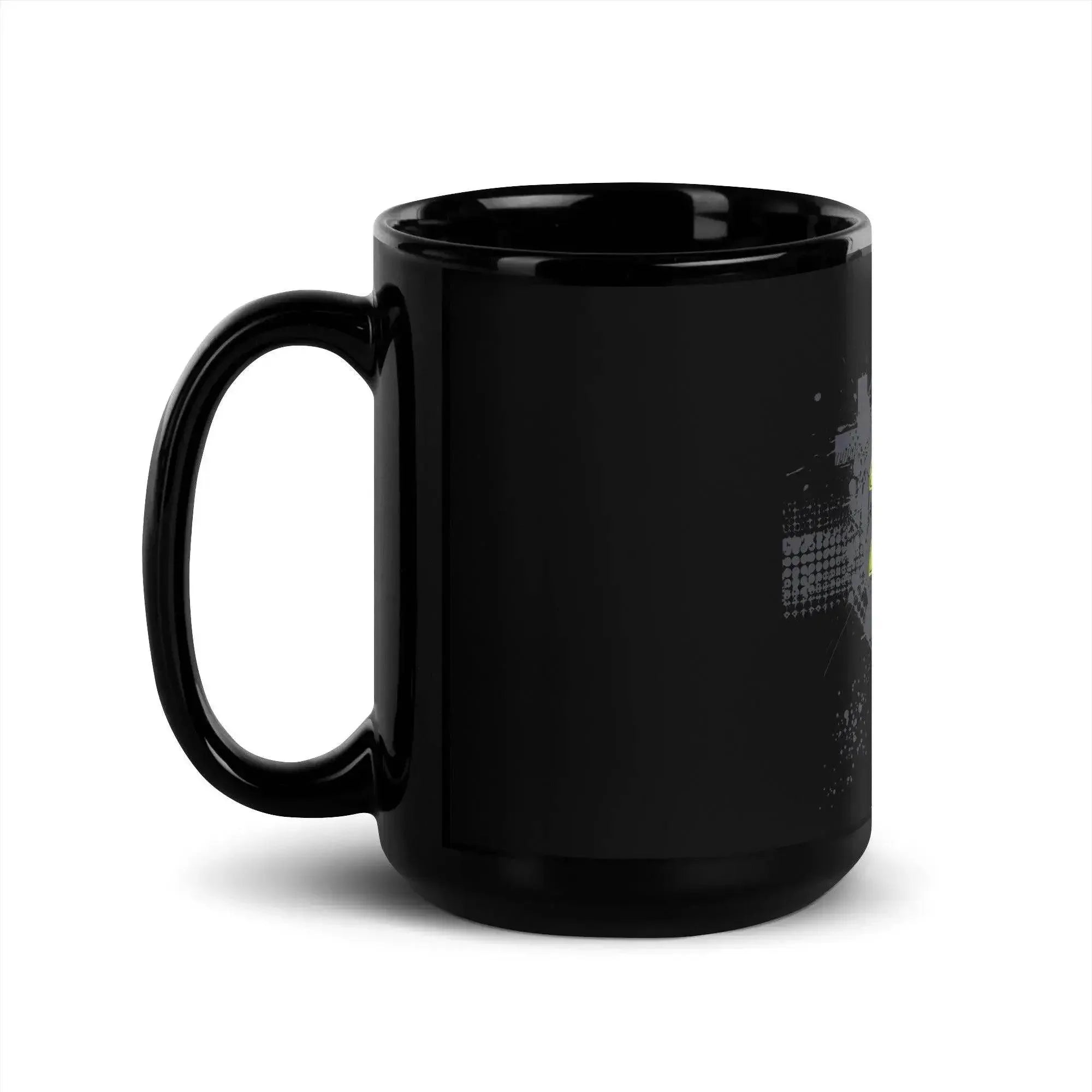 Black glossy coffee mug with abstract white and yellow graphic, Ivorynn home essentials.