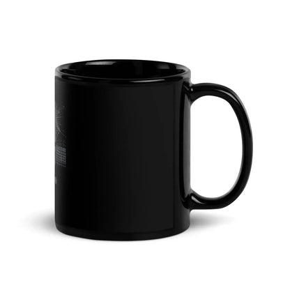 Glossy black ceramic mug with handle, minimalist style, available at Ivorynn