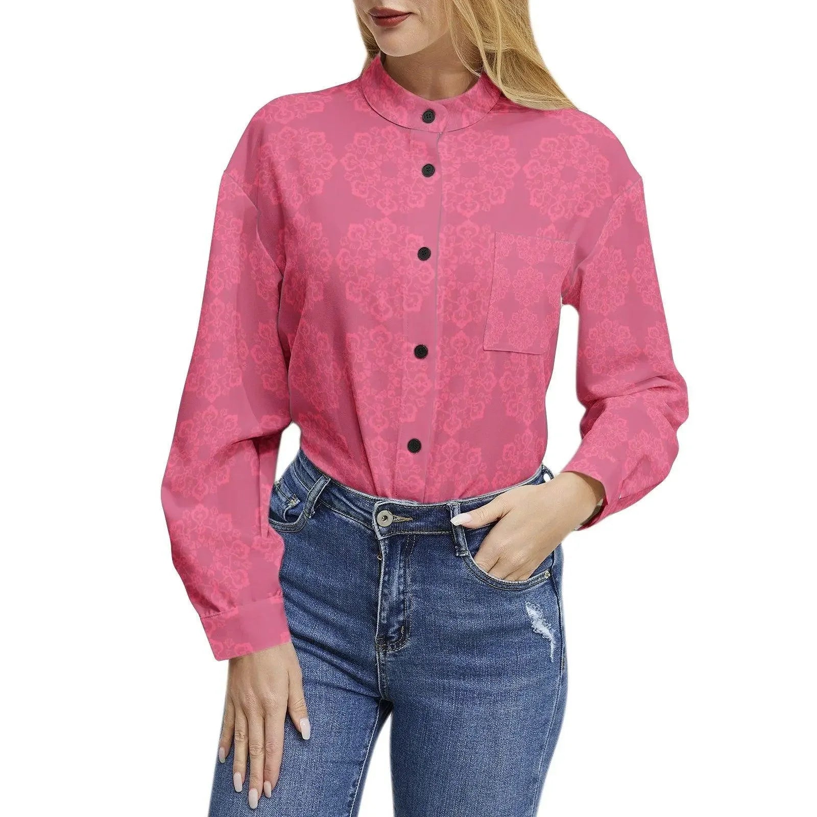 Women’s floral long sleeve pink button-up shirt with pocket, paired with blue jeans