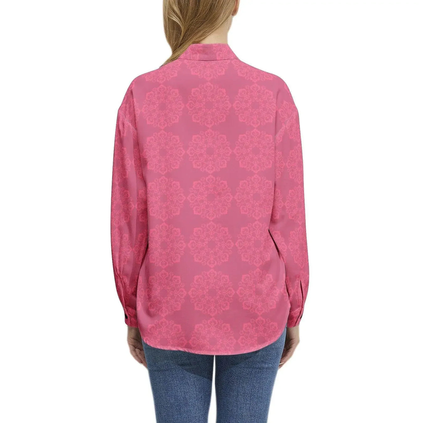 Woman wearing a pink floral long-sleeve button-up casual shirt from Ivorynn