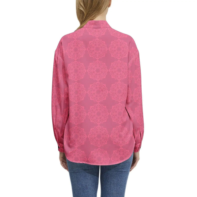 Woman wearing a pink floral long-sleeve button-up casual shirt from Ivorynn