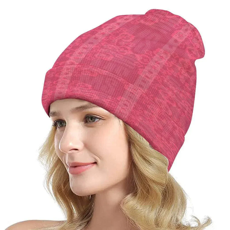 Woman wearing pink floral knitted hat, stylish winter accessory from Ivorynn fashion store