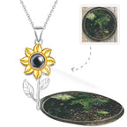 Gold sunflower pendant necklace with projection feature displaying a succulent image, Ivorynn jewelry