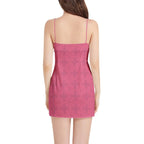 Woman modeling sleeveless pink spaghetti strap mini dress with subtle floral pattern, Ivorynn fashion